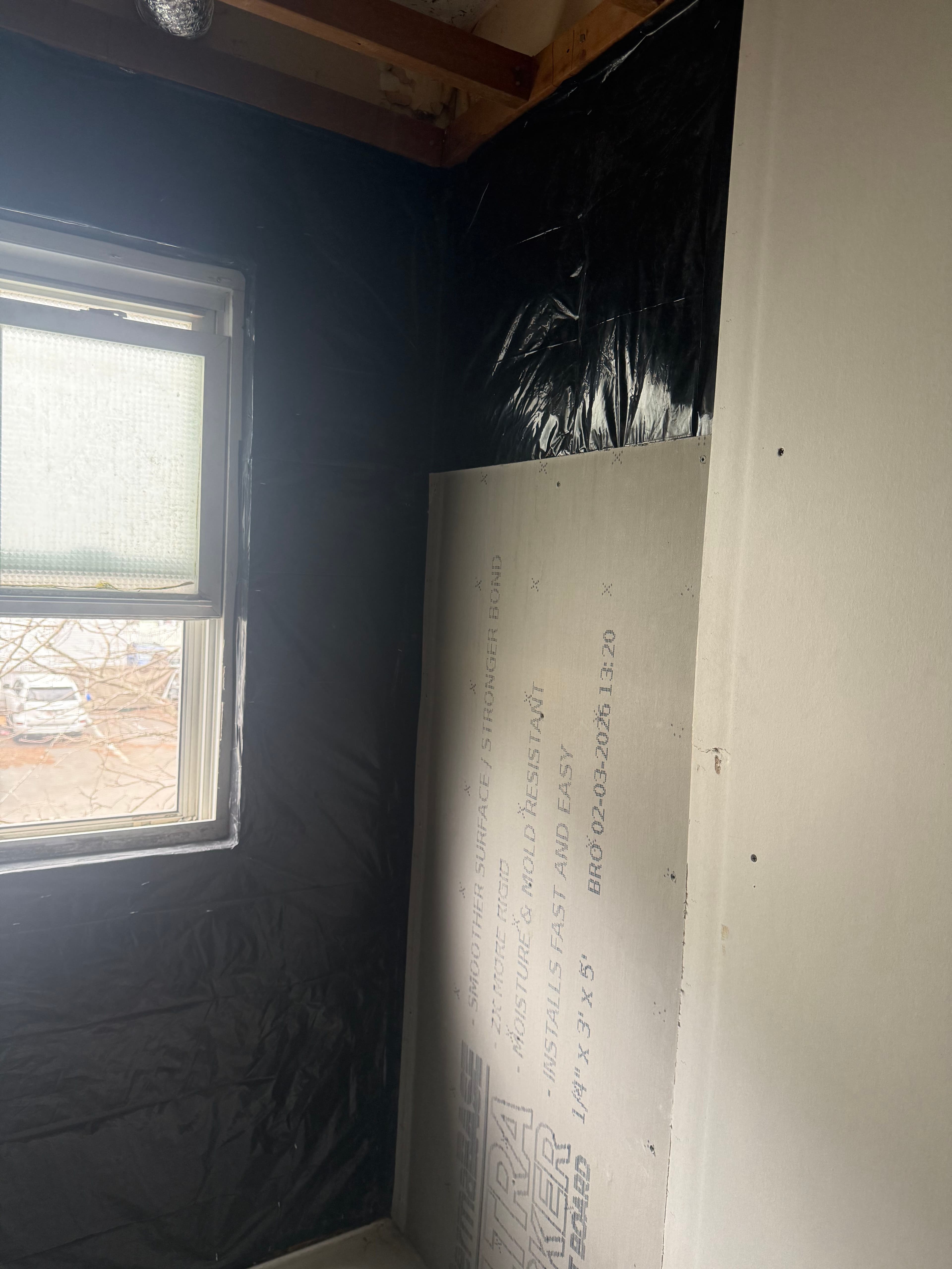 Project Bathroom Remodel in Progress - Insulation, Sheetrock and Vapor Barrier Done image