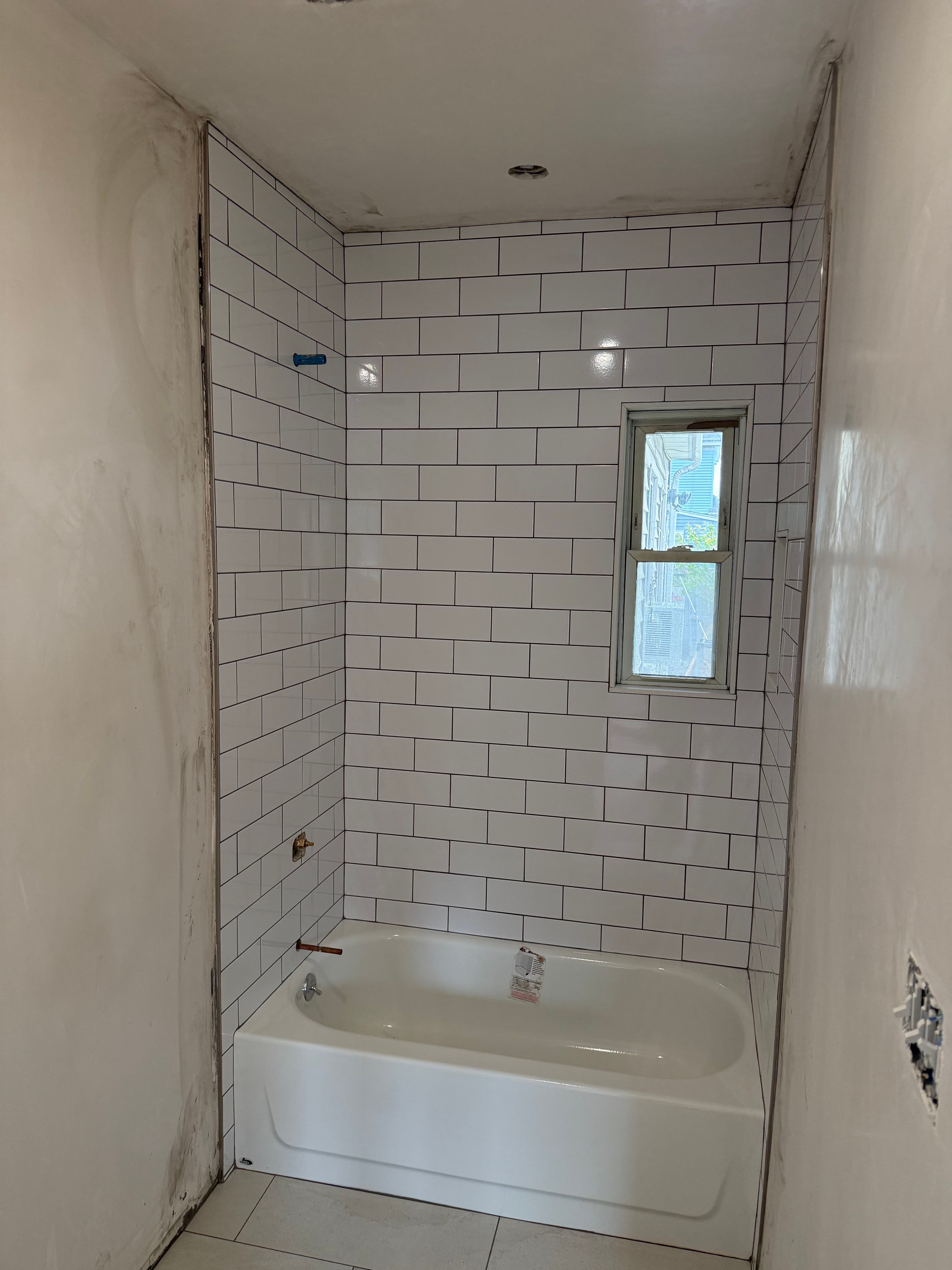 Project Bathroom Remodel in Progress - Fresh Tile Work Taking Shape image