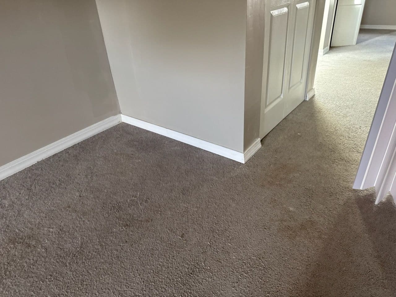 Stylish Hallway Upgrade with Baseboard Finish