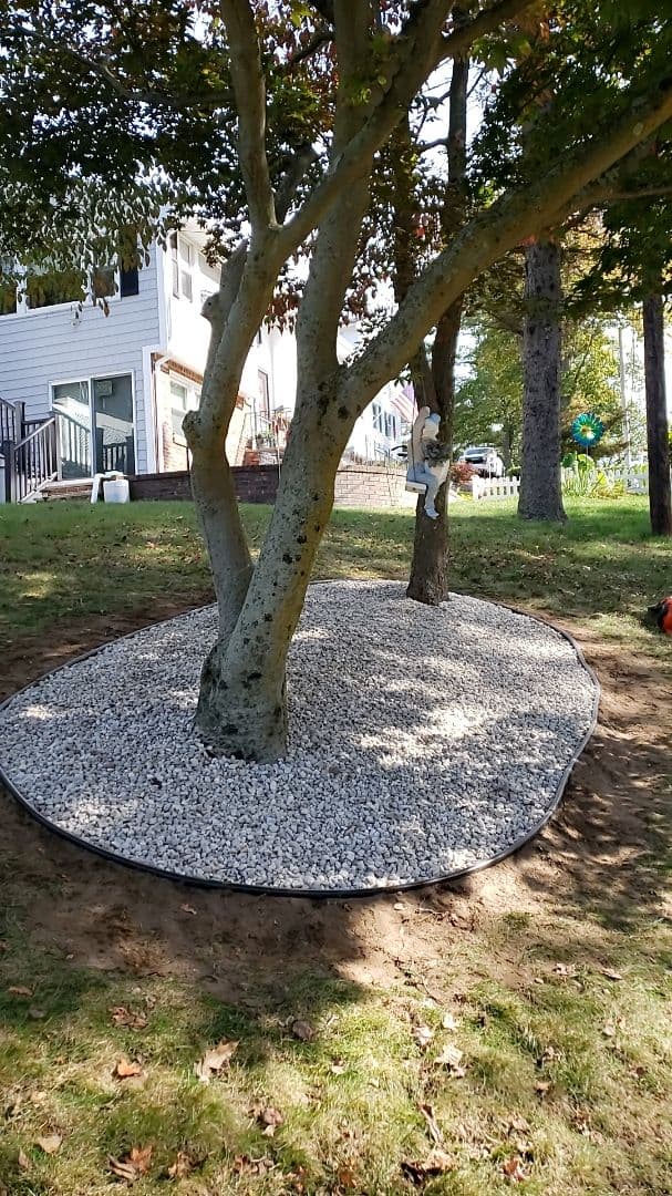 Edged Stone Bed Installation and Garden Charm