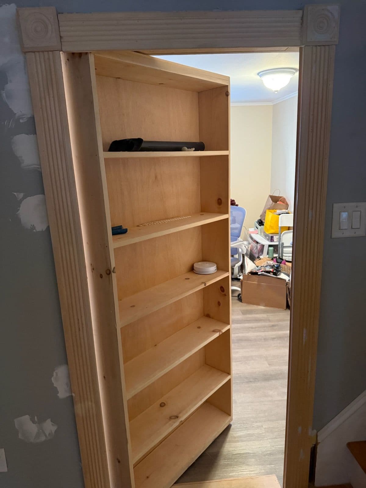 Gallery photos for Innovative Murphy Door Bookshelf Installation: Image #1